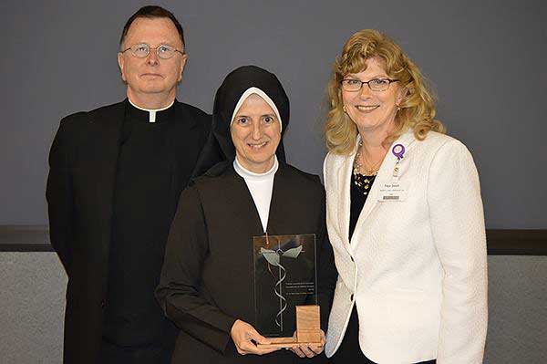 Sr. Peter Lillian receives Father Dunklee Award